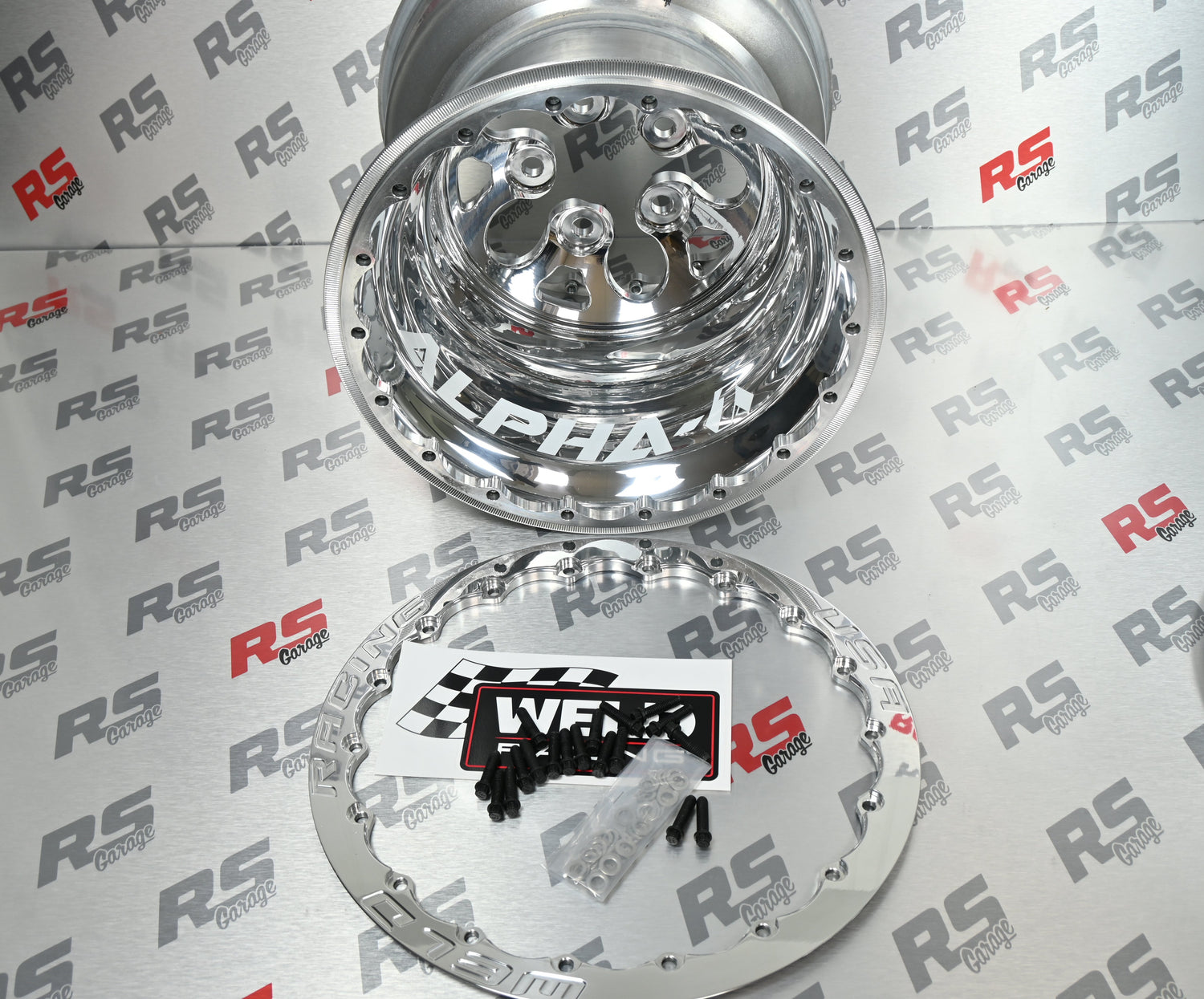 Chrome car wheel hub and cover on a branded background