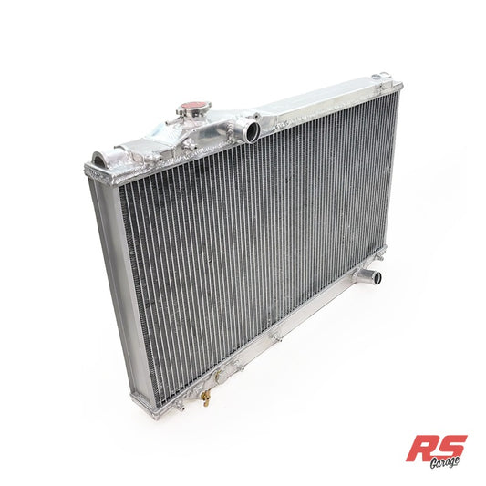 PHR Aluminum Race Radiator for MKIV Supra - Internal Transmission Cooler (Inside Radiator), OEM hose inlet and outlet, Polished